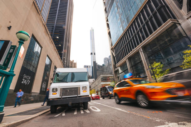 Post Service trucks in New York City Post Service trucks in New York City lower Manhattan district. delivery van stock pictures, royalty-free photos & images