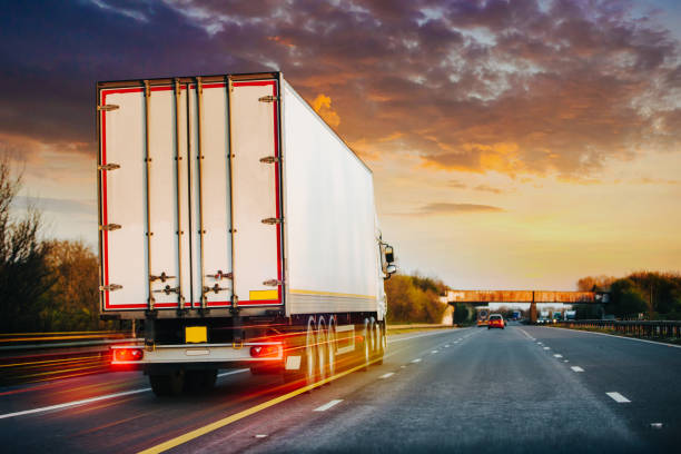 Lorry motion Traffic Transport on motorway in motion Lorry on M1 motorway in motion near London delivery van stock pictures, royalty-free photos & images